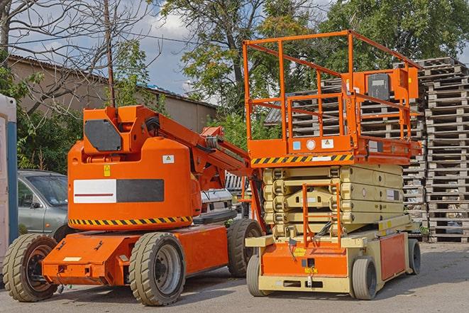 industrial forklift transporting goods in a warehouse in Acushnet